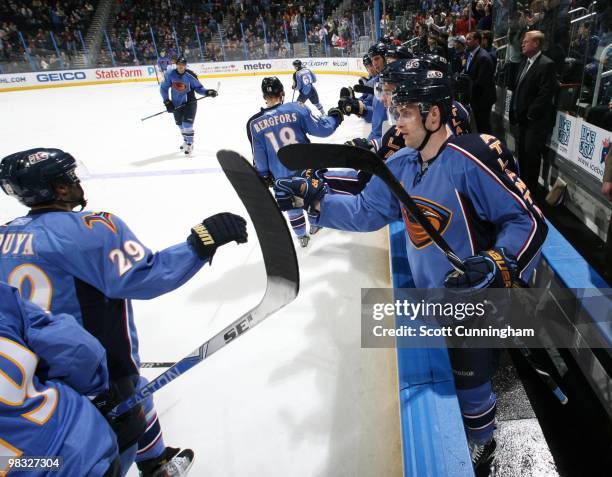 Rich Peverley and Johnny Oduya of the Atlanta Thrashers celebrate after a goal against the Phoenix Coyotes at Philips Arena on March 14, 2010 in...