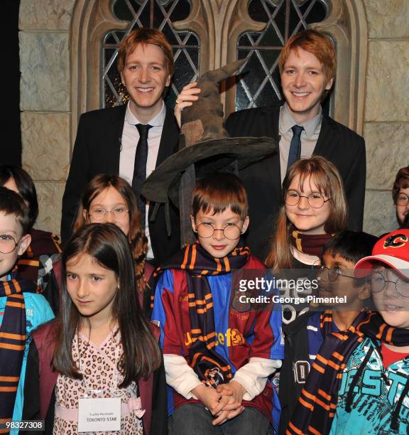 Actors James Phelps , Oliver Phelps and students attend Harry Potter: The Exhibition at the Ontario Science Centre on April 8, 2010 in North York,...
