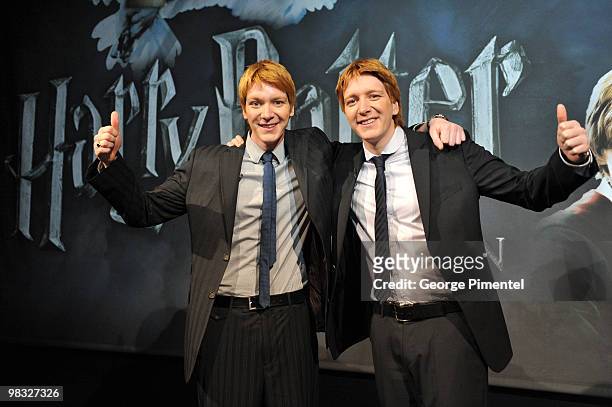 Actors James Phelps and Oliver Phelps attend Harry Potter: The Exhibition at the Ontario Science Centre on April 8, 2010 in North York, Canada.