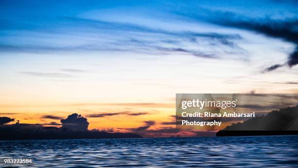afternoon sky over sukar island, indonesia - north maluku stock pictures, royalty-free photos & images