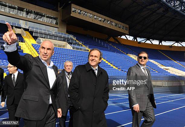President French Michel Platini examines FC Metalist stadium in Ukrainian city of Kharkiv on April 8, 2010. Platini accompanied by UEFA...