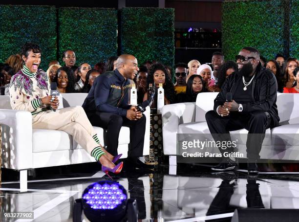 Tami Roman and Charlamagne tha God speak with Rick Ross during After Party Live, sponsored by Ciroc, at the 2018 BET Awards Post Show at Microsoft...