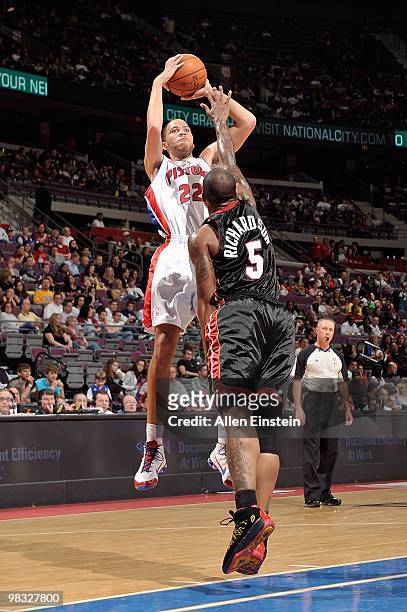 Tayshaun Prince of the Detroit Pistons shoots against Quentin Richardson of the Miami Heat during the game on March 31, 2010 at The Palace of Auburn...