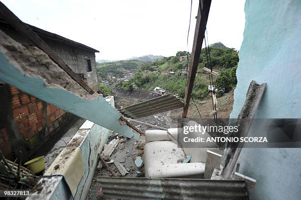 View of a partly destroyed house on the top of a hill following a landslide in Vicoso Jardim shantytown on April 08, 2010 in Niteroi, 25 Km northern...