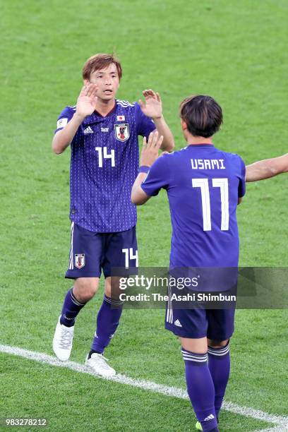 Takashi Inui of Japan is replaced by Takashi Usami during the 2018 FIFA World Cup Russia group H match between Japan and Senegal at Ekaterinburg...