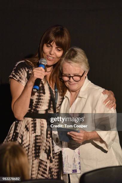 Betsy Leighton hugs the winner of the Jan Marino Scholership Lesli "Z" Zephyr with at the Who Runs the Show? Women Panel at the SeriesFest: Season 4...