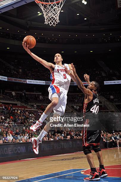 Austin Daye of the Detroit Pistons goes to the basket against Udonis Haslem of the Miami Heat during the game on March 31, 2010 at The Palace of...