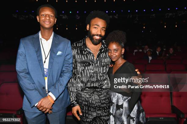 Justin Blackman, Donald Glover and Naomi Wadler attend the 2018 BET Awards at Microsoft Theater on June 24, 2018 in Los Angeles, California.