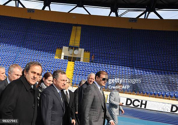 President French Michel Platini examines FC Metalist stadium in Ukrainian city of Kharkiv on April 8, 2010. Platini accompanied by UEFA...