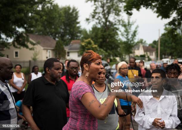 Juanita Spencer speaks at a vigil for Thurman Blevins on June 24, 2018 in Minneapolis, Minnesota. Blevins was shot and killed yesterday after an...