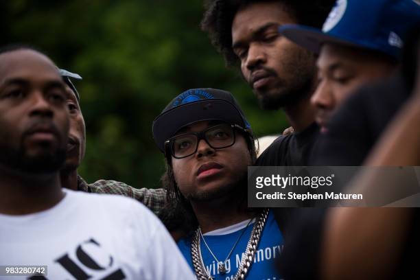 DuPrece Slaughter listens to a speaker at a vigil for his uncle, Thurman Blevins, for him on June 24, 2018 in Minneapolis, Minnesota. Blevins was...
