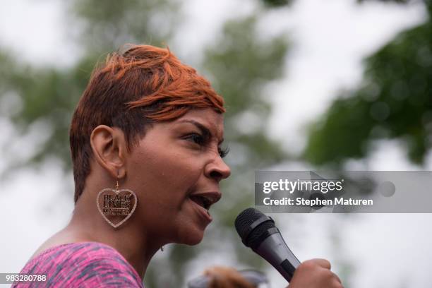 Juanita Spencer speaks at a vigil for Thurman Blevins on June 24, 2018 in Minneapolis, Minnesota. Blevins was shot and killed yesterday after an...