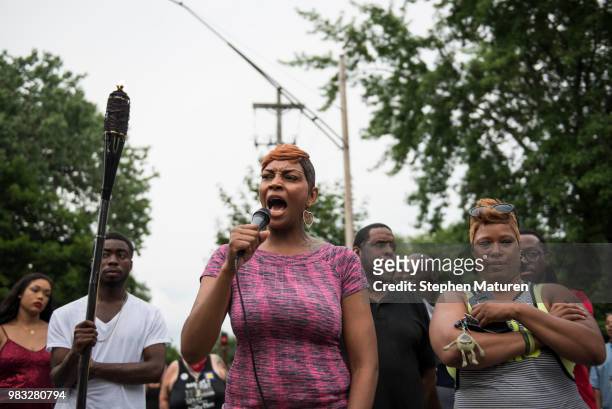 Juanita Spencer speaks at a vigil for Thurman Blevins on June 24, 2018 in Minneapolis, Minnesota. Blevins was shot and killed yesterday after an...