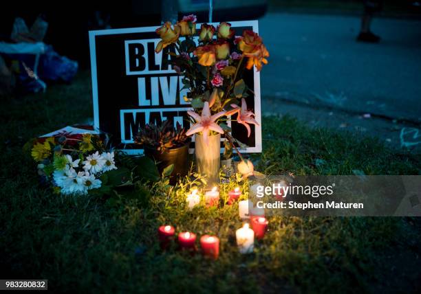 Candles illuminate a memorial at a vigil for Thurman Blevins on June 24, 2018 in Minneapolis, Minnesota. Blevins was shot and killed yesterday after...