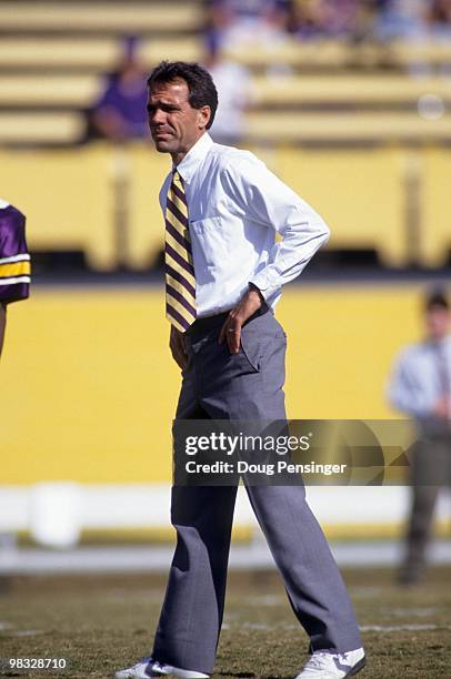 Head coach Bill Lewis of East Carolina Pirates watches the action during a game against the Tulane Green Wave at Dowdy-Ficklen Stadium on November...