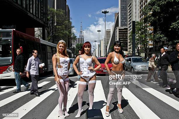 Models wearing underwear perform at the Paulista Avenue in Sao Paulo, Brazil on April 8 to promote the 16th Erotika Fair, Latin America's biggest...