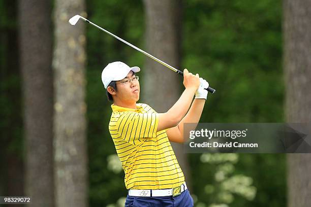 Byeong-Hun An of South Korea hits his second shot on the 11th hole during the first round of the 2010 Masters Tournament at Augusta National Golf...