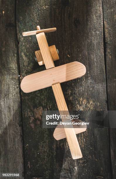 vintage wooden plane on wooden board - hardwood tree stock pictures, royalty-free photos & images