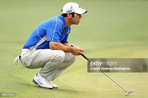 Paul Casey of England lines up a putt on the eighth green during the first round of the 2010 Masters Tournament at Augusta National Golf Club on...