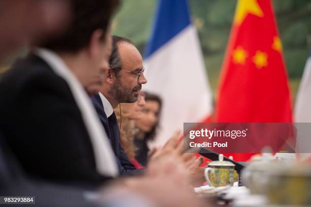 French Prime Minister Edouard Philippe meets with China's President Xi Jinping at the Great Hall of the People in Beijing on June 25, 2018.