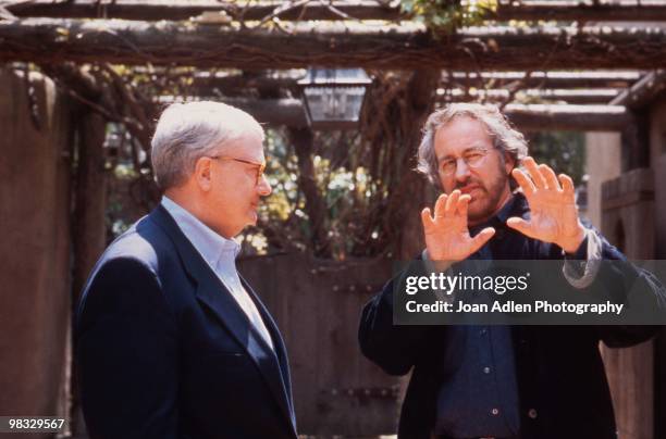 Film director Steven Spielberg and movie critic Roger Ebert chat on the set of the 'Siskel & Ebert Anniversary Special' on April 2, 1996 in Los...