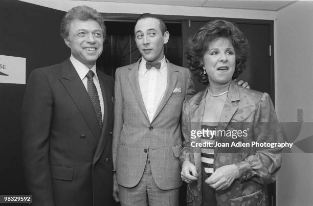 Performers and husband and wife Steve Lawrence and Eydie Gorme pose with actor and comedian Pee Wee Herman during a break in taping of the TV show...