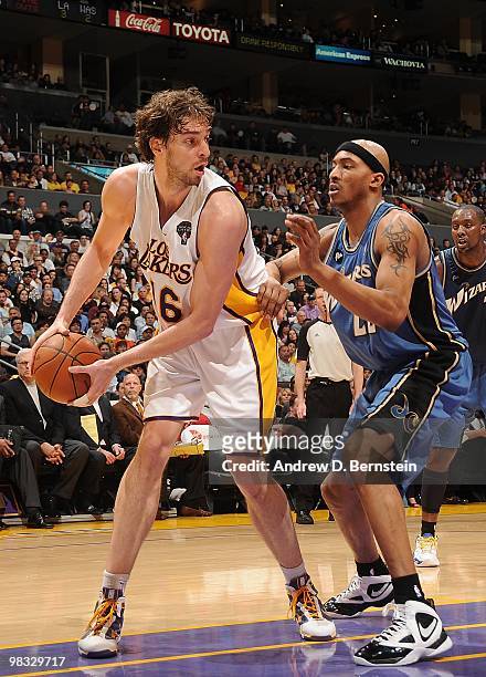 Pau Gasol of the Los Angeles Lakers handles the ball against James Singleton of the Washington Wizards during the game on March 21, 2010 at Staples...