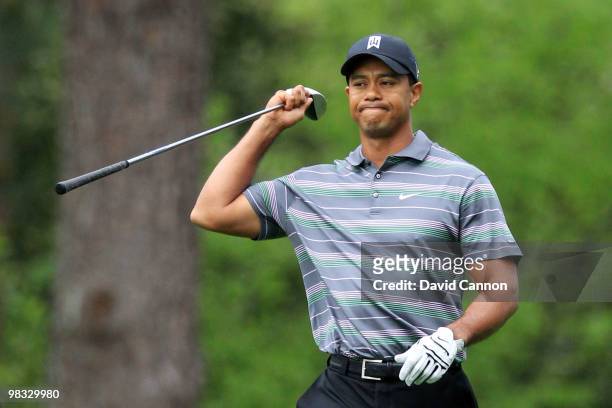 Tiger Woods reacts to a poor shot on the second hole during the first round of the 2010 Masters Tournament at Augusta National Golf Club on April 8,...