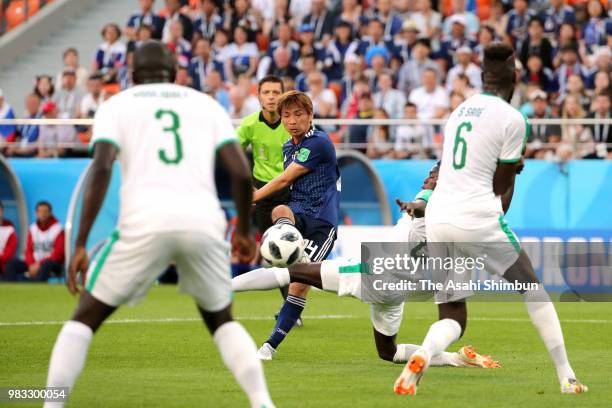 Takashi Inui of Japan scores his side's first goal during the 2018 FIFA World Cup Russia group H match between Japan and Senegal at Ekaterinburg...