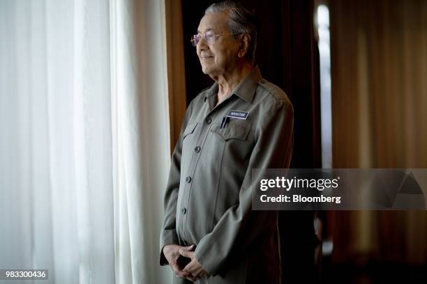 Mahathir Mohamad, Malaysias prime minister, stands for a photograph in his office in Kuala Lumpur, Malaysia, on Friday, June 22, 2018. Mahathir said...