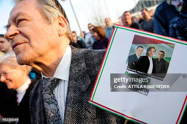 An elderly local man listens to the speech of the Prime Minister candidate and leader of right-wing nationalist 'Jobbik' party, Gabor Vona as he...