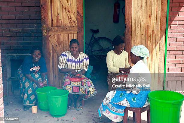 Madonna's Tour of one of the Raising Malawi initiative's - Mphandula Childcare Centre which supports over 350 Children from the surrounding Namitete...