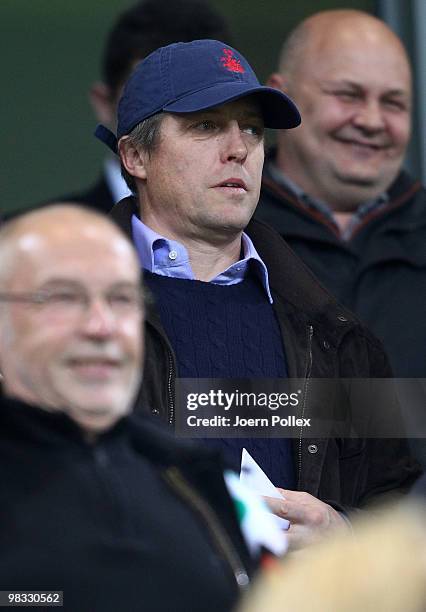 Actor Hugh Grant is seen prior to the UEFA Europa League quarter final second leg match between VfL Wolfsburg and Fulham at Volkswagen Arena on April...