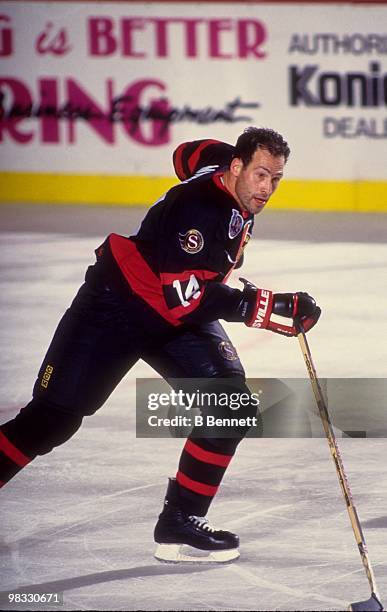 Brad Marsh of the Ottawa Senators skates on the ice during an NHL game against the New York Islanders circa 1992-93 at the Nassau Coliseum in...