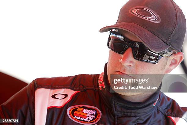 Jason Bowles, driver of the Childress Institute for Pediatric Trauma Chevrolet, prepares to drive during practice for the Jimmie Johnson Foundation...