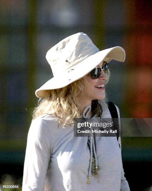 Madonna arrives at one of the Raising Malawi initiative's - Mphandula Childcare Centre which supports over 350 Children from the surrounding Namitete...