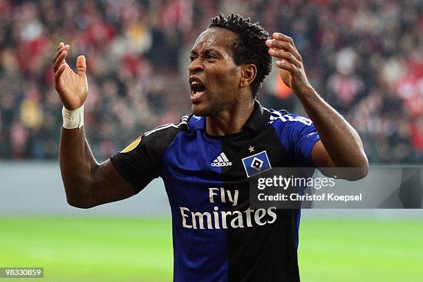 Ze Roberto of Hamburg celebrates the first goal during the UEFA Europa League quarter final second leg match between Standard Liege and Hamburger SV...