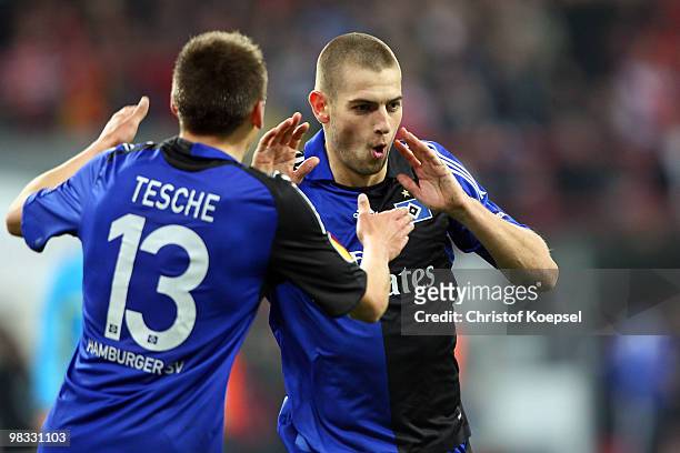 Mladen Petric of Hamburg celebrates the second goal with Robert Tesche of Hamburg during the UEFA Europa League quarter final second leg match...