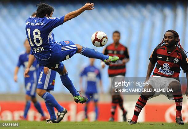 Brazil's Flamengo Vagner Love vies for the ball with Chile's Universidad Edson Puch during their Libertadores Cup match at Maracana stadium in Rio de...