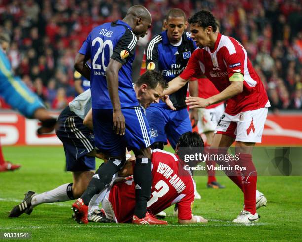 Goalkeeper Frank Rost of Hamburg argues with Victor Ramos of Liege during the UEFA Europa League quarter final second leg match between Standard...