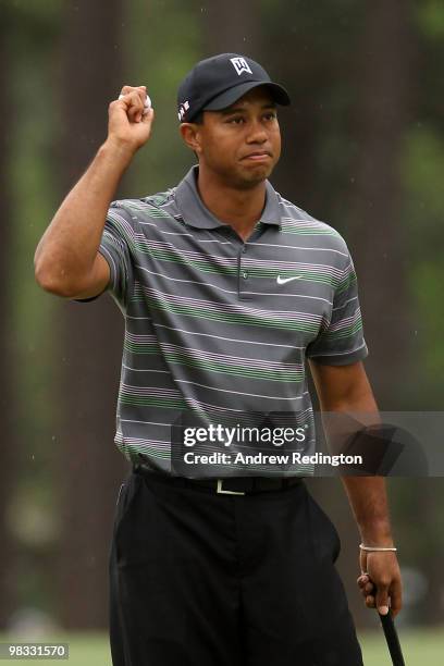 Tiger Woods celebrates making eagle on the eighth hole during the first round of the 2010 Masters Tournament at Augusta National Golf Club on April...