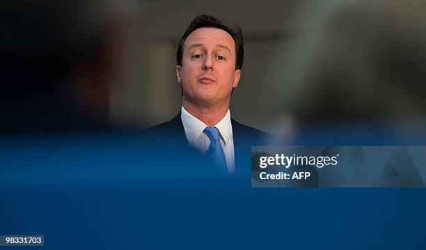 Conservative Party leader David Cameron talks to members of the community at Sir John Hunt Community sports college during an election visit to...