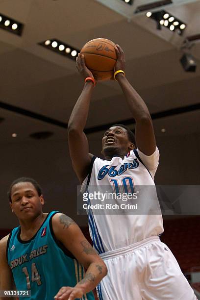 Kyle Weaver of the Tulsa 66ers goes up for the shot against Chris McCray of the Sioux Falls Skyforce during Game One of the First Round of the 2010...