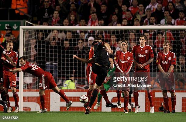 Oscar Cardozo of Benfica scores his team's first goal during the UEFA Europa League Quarter Final second leg match between Liverpool and Benfica at...