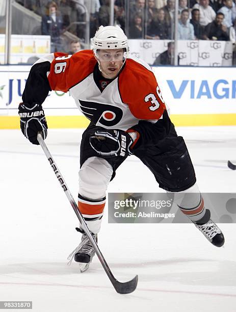 Darroll Powe of the Philadelphia Flyers skates up the ice during an NHL game against the Toronto Maple Leafs at the Air Canada Centre on April 6,...