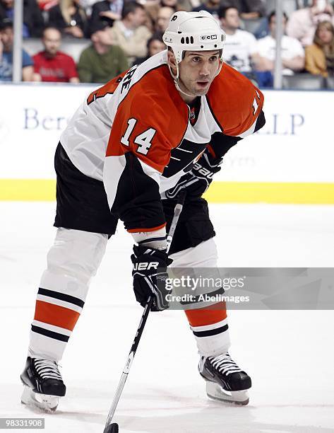 Ian Laperriere of the Philadelphia Flyers lines up for a faceoff during an NHL game against the Toronto Maple Leafs at the Air Canada Centre on April...