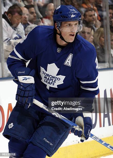Dion Phaneuf of the Toronto Maple Leafs skates up the ice during an NHL game against the Philadelphia Flyers at the Air Canada Centre on April 6,...