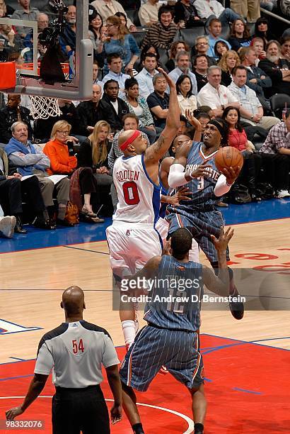 Gerald Wallace of the Charlotte Bobcats goes to the basket against Drew Gooden of the Los Angeles Clippers during the game on February 22, 2010 at...