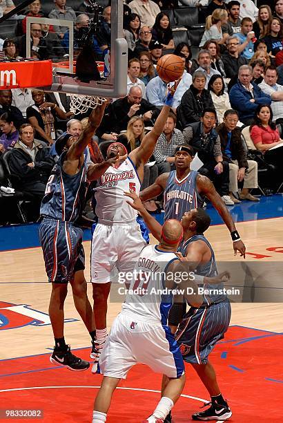 Craig Smith of the Los Angeles Clippers puts a shot up over Tyrus Thomas of the Charlotte Bobcats during the game on February 22, 2010 at Staples...