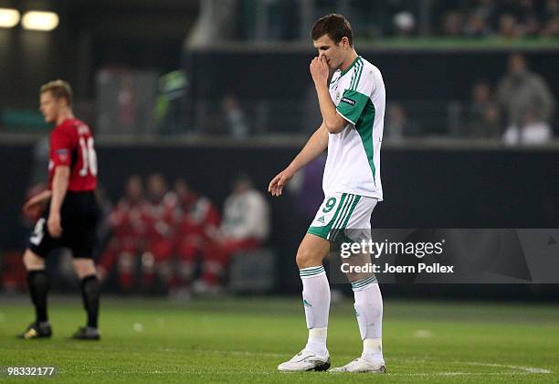 Edin Dzeko of Wolfsburg looks dejected during the UEFA Europa League quarter final second leg match between VfL Wolfsburg and Fulham at Volkswagen...